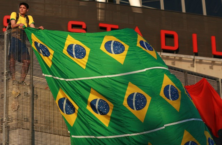 Fan with huge Brazilian Flag